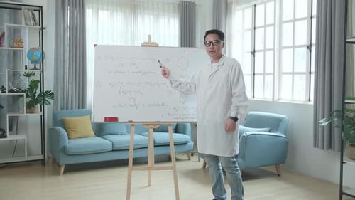 Science Teacher Explaining Chemical Equations on Whiteboard