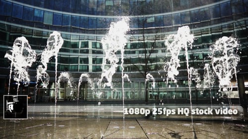 Fountain Display in an Urban Environment at Night