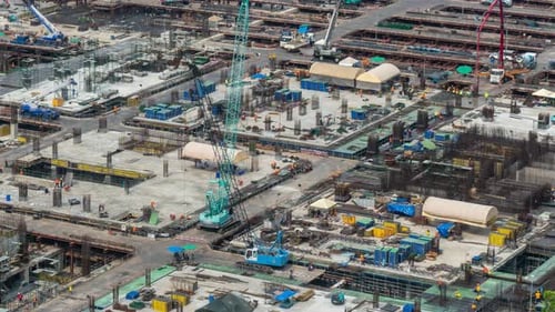 Time Lapse of Construction Site with Heavy Construction Machinery in Metropolis