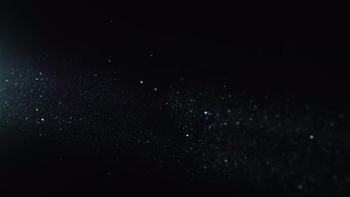 Abstract Particle Dust Shimmering Over Dark Background