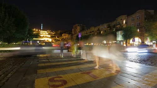 People Crossing Street on Zebra Near Cascade, Evening Rush Hour Time-Lapse