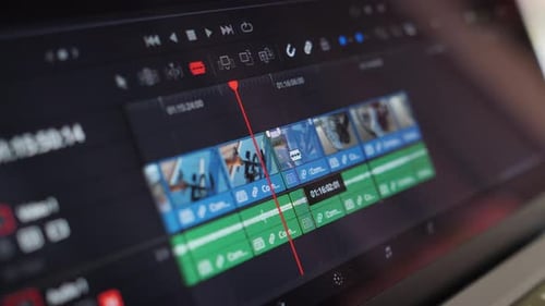 Video content creator editor working on footage in post production program