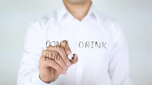 Don't Drink And Drive Man Writing on Glass