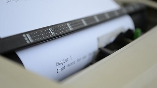 Close Up Typing on an Old Typewriter