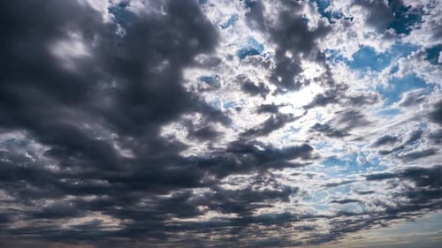 Dramatic Clouds Drifting in a Partly Blue Sky
