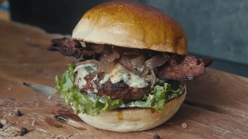 Burger on Wooden Board