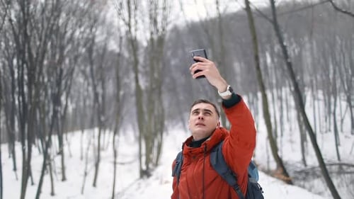 Lost Connection, Man in Forest Searching for Mobile Signals