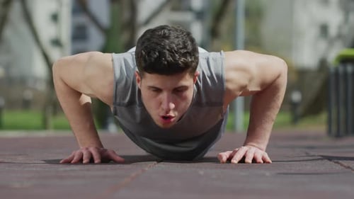 Plank with knee to elbow