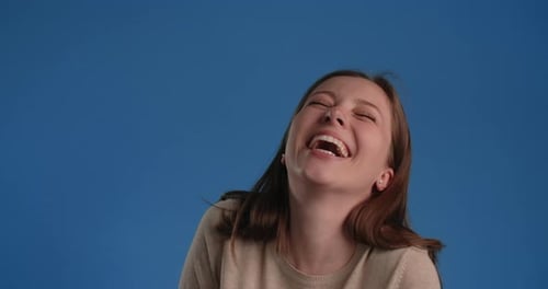Woman Laughs Gleefully on the Blue Screen Chroma Key 60p Prores