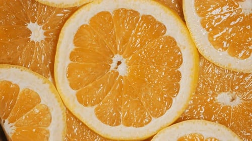 Vibrant Orange Citrus Slices Overhead Close-Up