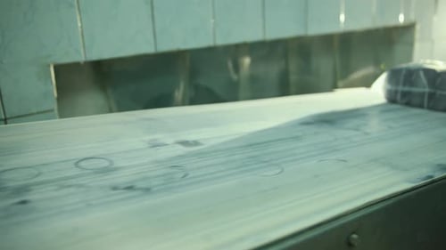 Packed Sugar at the Sugar Beet Factory Rides on Conveyor Belt