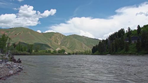 Snake river flowing on beautiful day in Wyoming