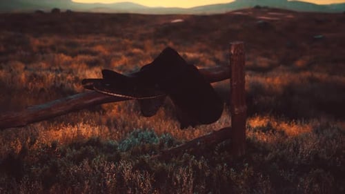 Old Saddle As the Sunset in the Country