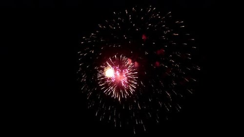 Bright Exploding Fireworks Lights on Black Background Closeup