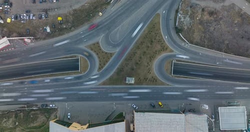 Aerial top View time lapse of busy freeway, rush hour heavy traffic jam highway.