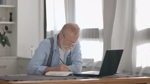Modern Elderly Male with Gray Hair and Glasses for Vision Is Nervous Because of Problem with Bank