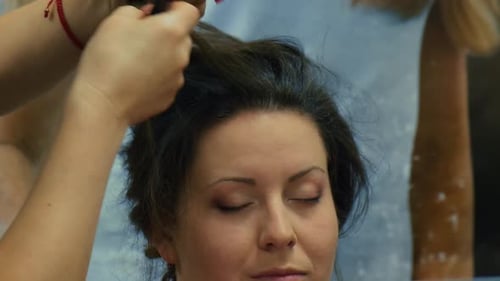 Hairstyling with Hair Spray Preparation for Prom