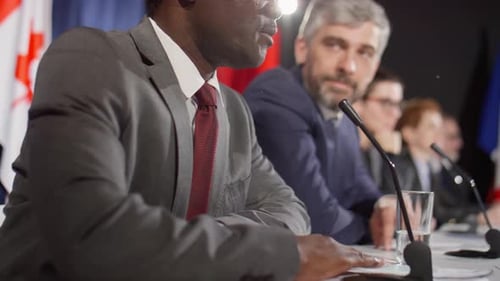 Adults at a Corporate Press Conference Meeting