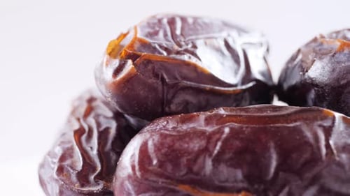 Date Fruit Rotate On White Background