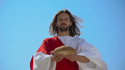 Homem generoso oferecendo pão, história bíblica para dar comida aos famintos, caridade