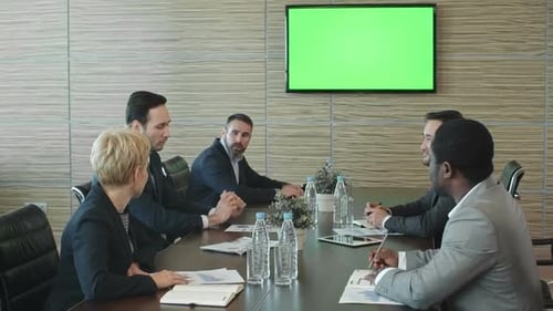 Diverse Business Team Meeting at Conference Table
