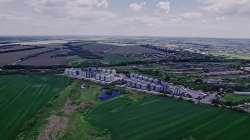 Aerial View New Grain Elevator and a Field in the Foreground