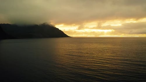 Flying Towards the Coast of Senja Island in Northern Norway at Sunset
