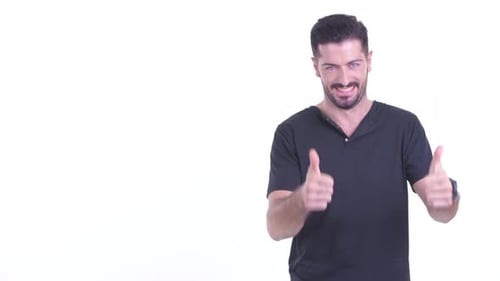Smiling Man Gesturing with Thumbs Up on White