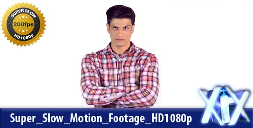 Confident Man in Plaid Shirt Crosses Arms