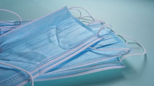 Close-Up of Stacked Disposable Face Masks