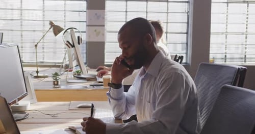 Young creative professionals working in a modern office