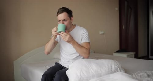 Man Drinks a Cold Water and Suffers Pain Tooth Sensitivity