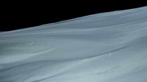 Abstract White Fabric Flowing Across Space Backdrop