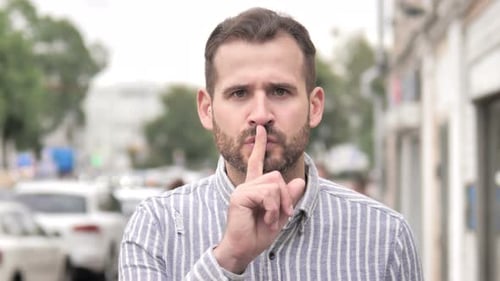 Silence Please, Finger on Lips by Beard Man