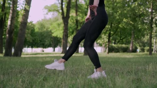 Woman Gymnast in a Jump