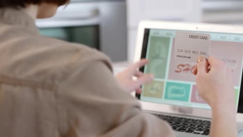 Woman Using Credit Card and Buying Thing in Online Shop