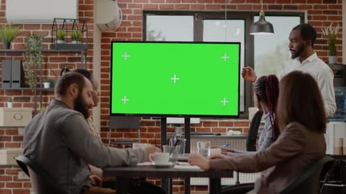 Business Man Presenting Monitor with Green Screen