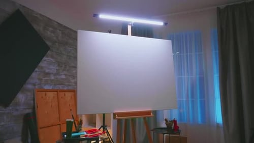 Painting Studio with Blank Canvas and Art Supplies