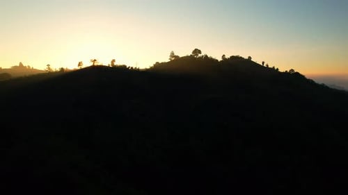 4K Drone Flying through the clouds at dusk or dawn. Aerial top cloudscape