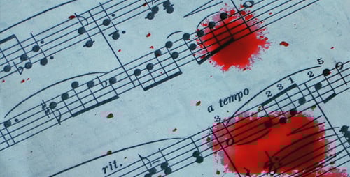Splatter of Red on Musical Notes Background
