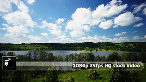 Scenic Lake Landscape with Blue Sky and Clouds