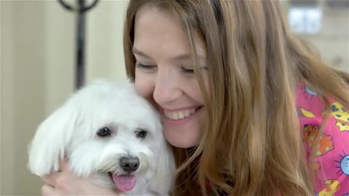 Smiling Woman and Yorkshire Terrier