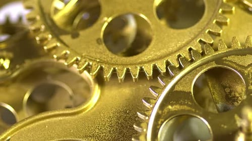 Close Up of Gold Gears Rotating
