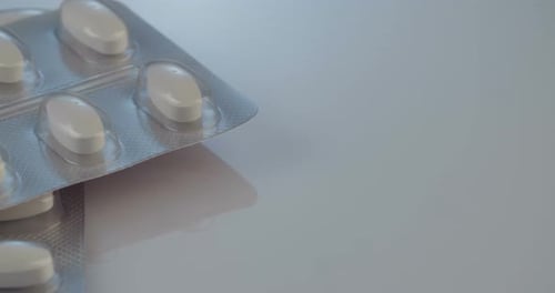 Blister Packs of White Medicine Pills, Close Up