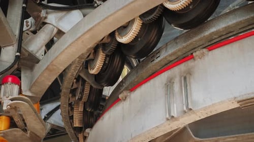 Rotating Metal Gears and Wheels Machinery Close Up