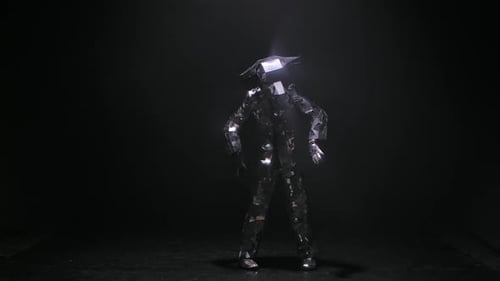 Dancer in Mirrored Suit Performing