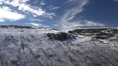 Thin Snow Layer on Bare Treeless Hills