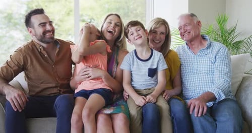 Happy Family Relaxing Together on the Couch