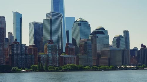 Modern High Rising Glass Buildings of Manhattan with Reflections on Windows
