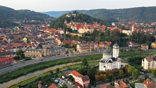 Aerial drone view of the Historic Centre of Sighisoara, Romania. Old buildings, Holy Trinity